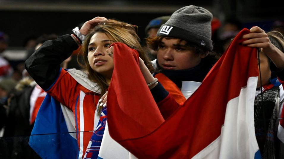 Sad Paraguay football fans